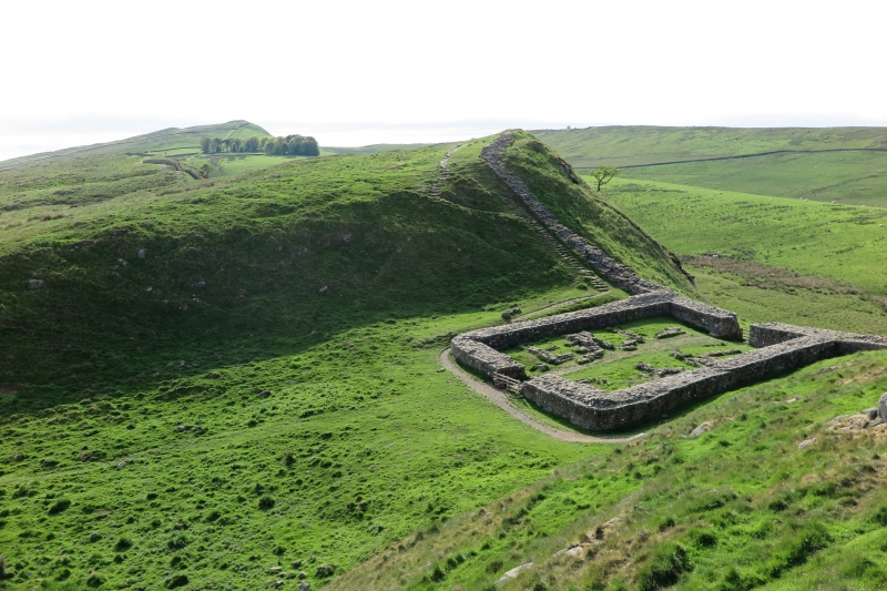 Figure 4: Milecastle 39 sits in a gap between two outcrops of bedrock on the forward edge of a short cliff known as the Whin Sill, the height of which enhanced the Wall.