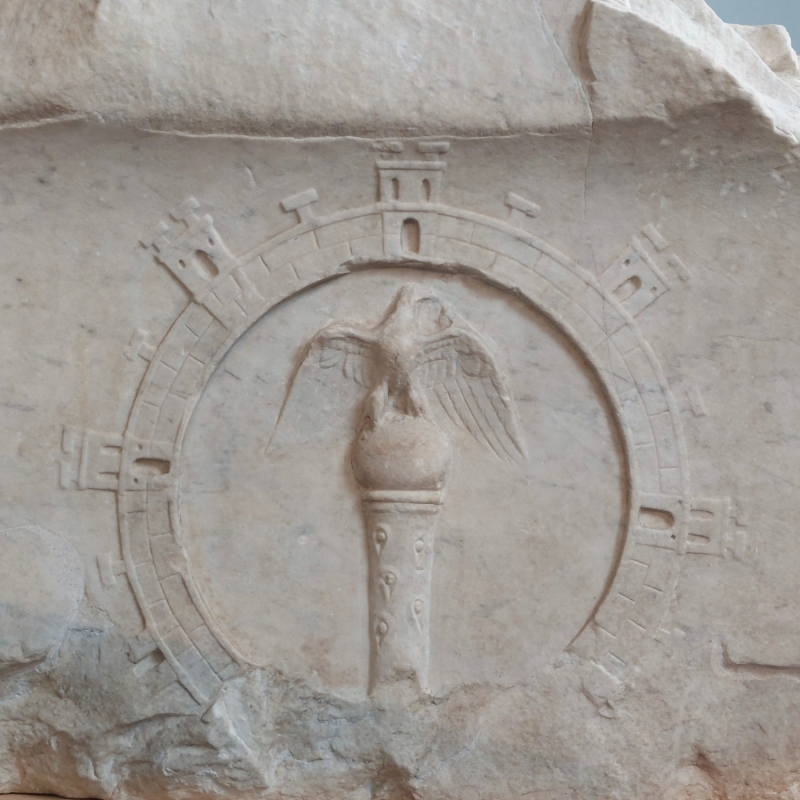 Figure 3: Rome, area of the Porticus Octaviae: Severan marble relief with (most probably) the frontiers of the Roman Empire surrounding the Imperial eagle sceptre.