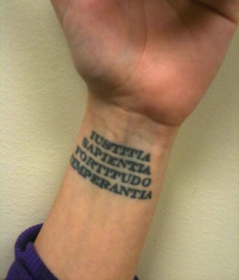 Fig. 9. “Iustitia, sapientia, fortitudo, temperantia” (justice, wisdom, fortitude, temperance; a variation on the four cardinal virtues of prudence, justice, fortitude, temperance) tattooed on a wrist. Photo: author.